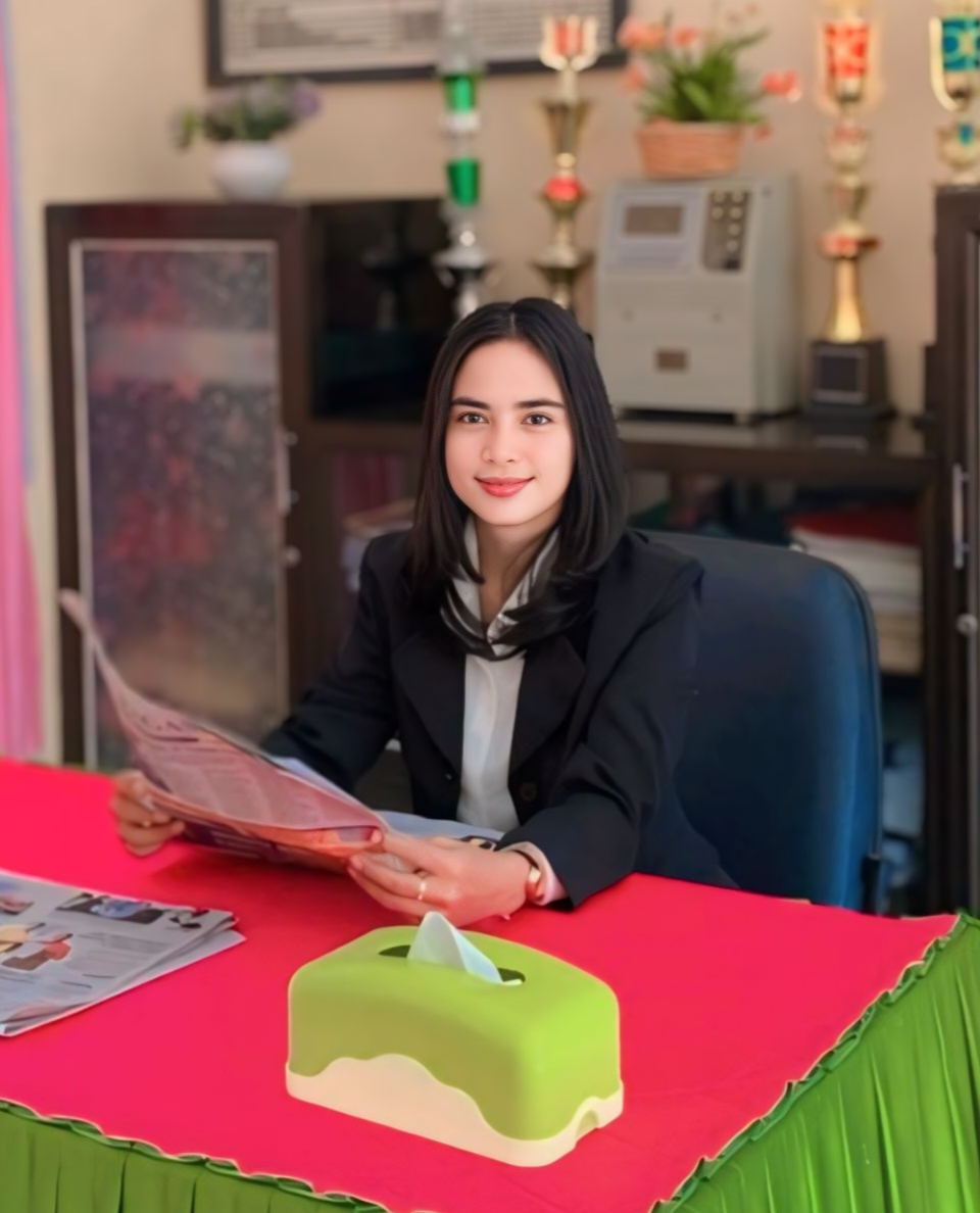 Yusliana Paelongan, S.Pd